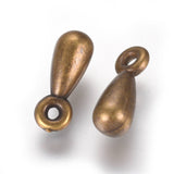 CCB Plastic Metallic Small Ghungroo Beads Charms 11x4 MM Drop (60+ Pieces, 5 GMs Wt) Antique Bronze Color [ac-bds-00064-m2]
